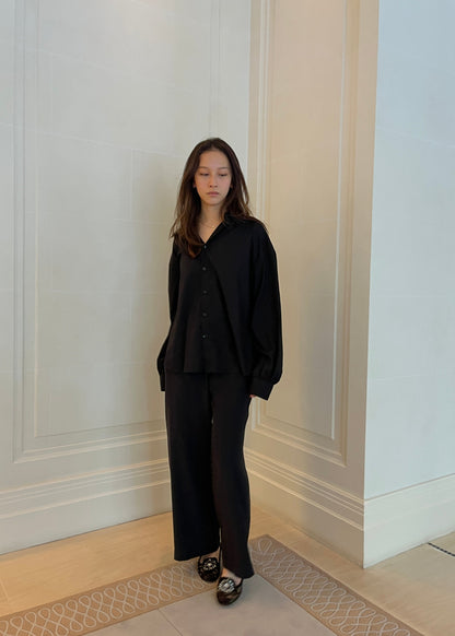 Black poet shirt showing cropped silhouette