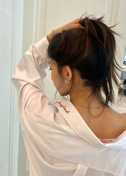 White poet shirt worn with drapey sleeves