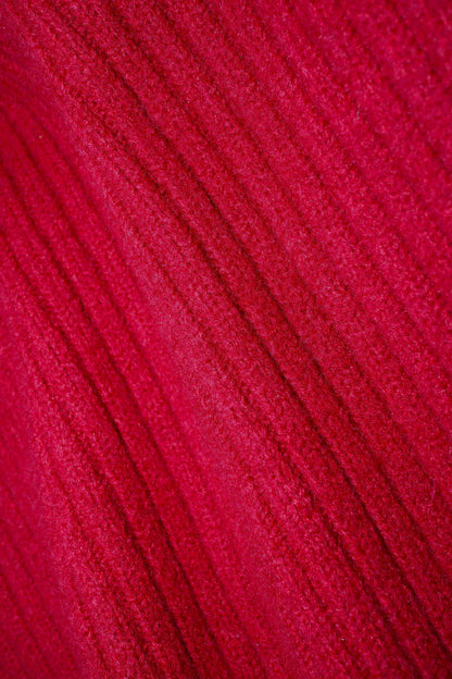 Close-up of a textured red fabric surface