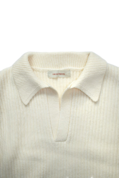 Champagne polo detail, ribbed cuff and embroidered signature